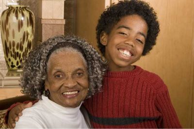 A Grandmother and Child posing and smiling
