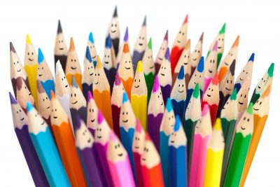 Colorful pencils as smiling faces people isolated. Social networking communication concept.